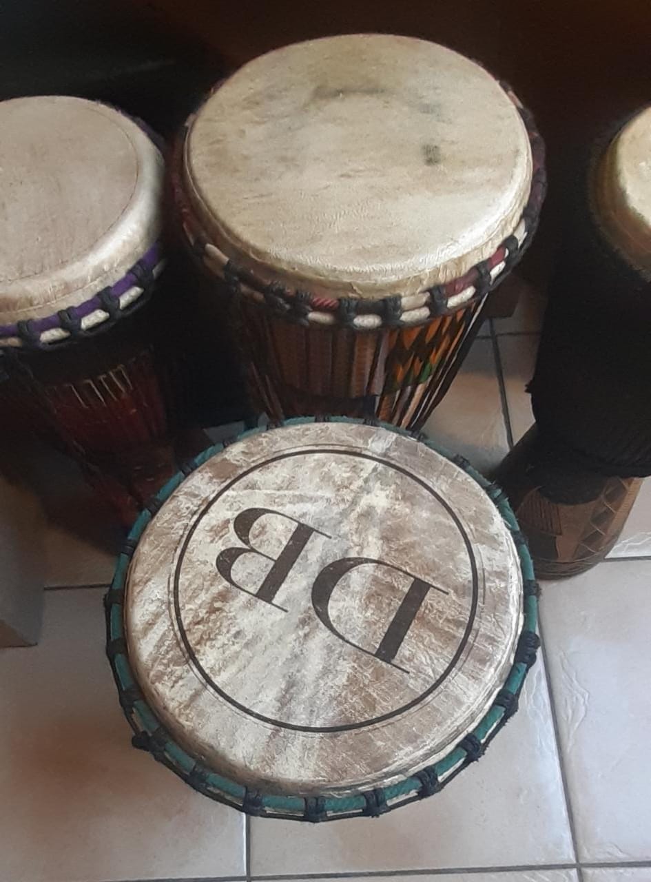 Custom branded djembe drum featuring De Beers logo